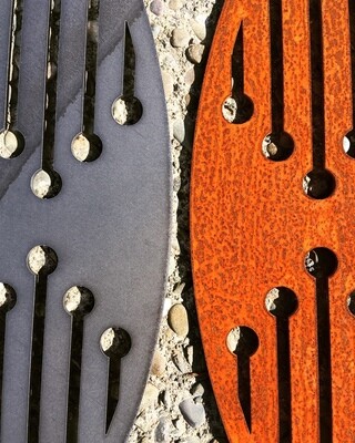 Reflection design by Grounded Art NZ  Clean raw Corten steel that turns golden with rusty patina once out in the weather.