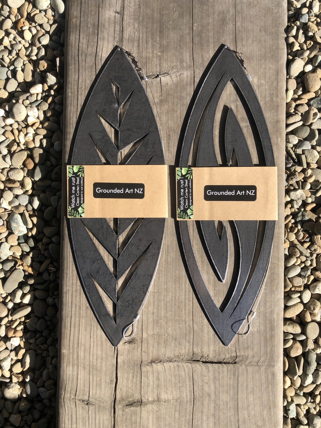 Leaf &amp; Fish Hook designs Corten Spinning Art by Grounded Art NZ. Proudly made by Brendon &amp; Jane Harley in South Otago, NZ.
