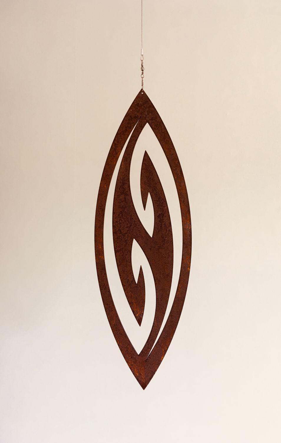 Fish Hook design Corten Spinning Art by Grounded Art NZ. Proudly made by Brendon &amp; Jane Harley in South Otago, New Zealand.