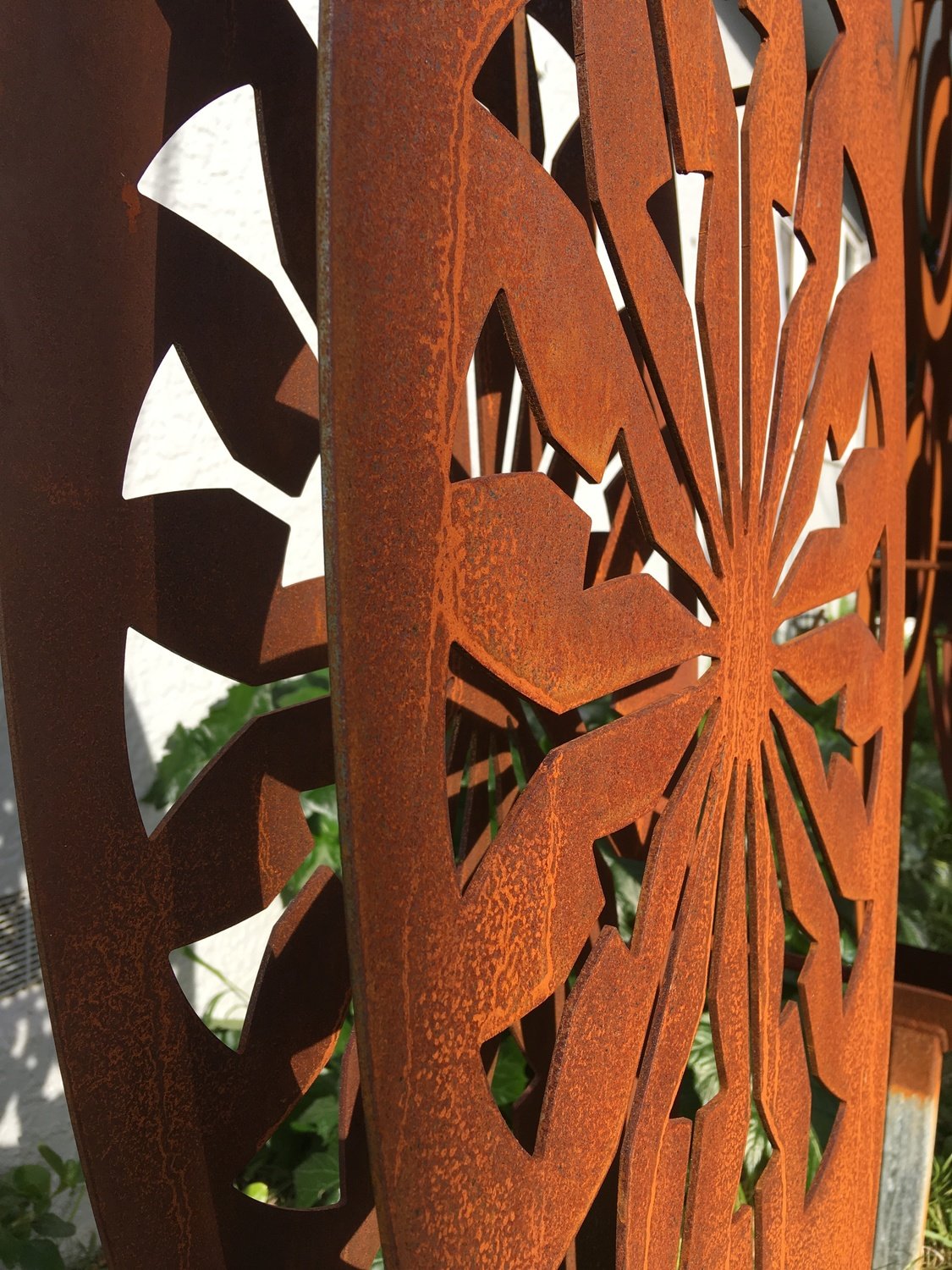 Close up detail of 3D Corten Tohu Sculpture in rusty Corten steel by Grounded Art NZ. South Otago, NZ