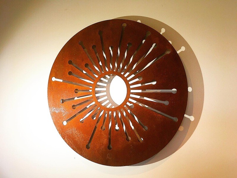 Corten Allium Wall Art by Brendon &amp; Jane Harley of Grounded Art NZ. Rusty patina pops against a light wall indoors or out. 