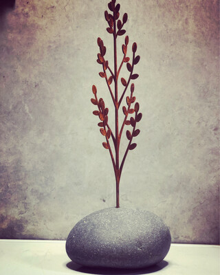 Toitiiti Botanical Sculpture by Grounded Art NZ. Corten steel garden art. Beautiful delicate design in a natural stone base. 