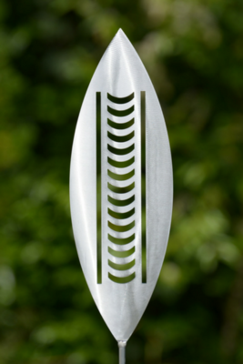 Nikau Aluminium Garden Art Spear by Grounded Art NZ in an established lush green native NZ garden. South Otago, New Zealand.