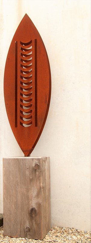Rusted up 3D Corten Nikau Sculpture made by Grounded Art NZ against a pale background.