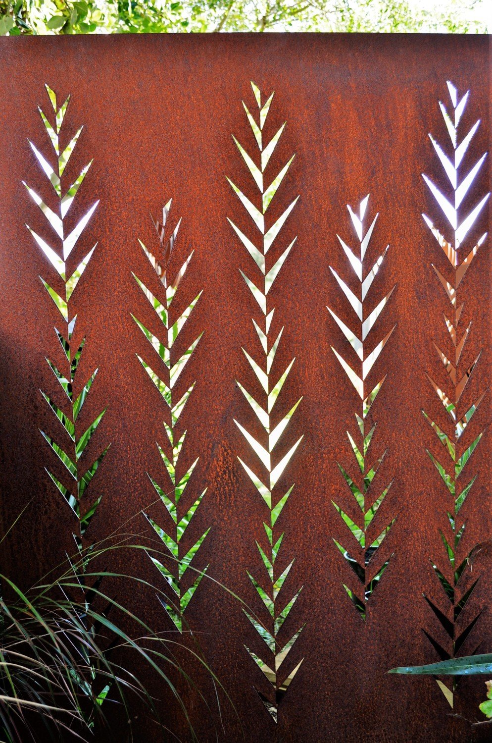 Leaf pattern detail in a Grounded Art NZ Leaf screen made of New Zealand Corten Steel.
