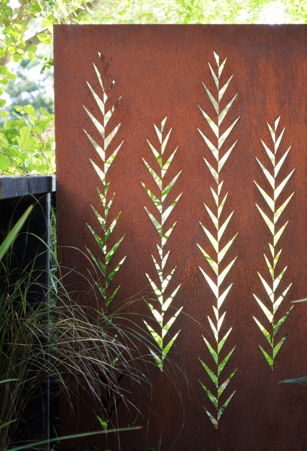 Leaf pattern detail in a Grounded Art NZ Leaf screen made of New Zealand Corten Steel.