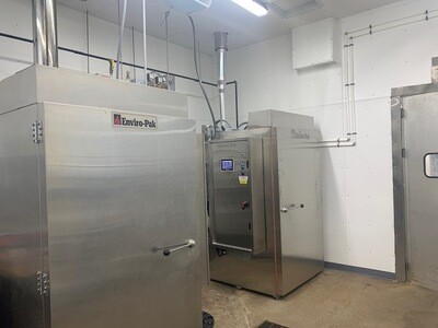 Cook BBQ Hog In Smokehouse