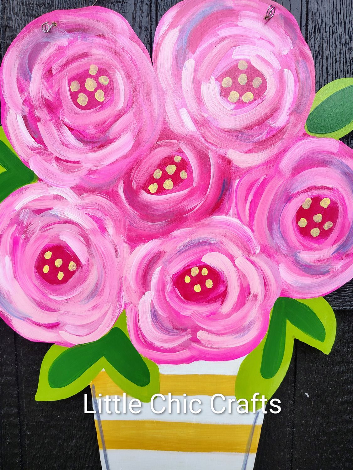 Bright striped vase floral arrangement