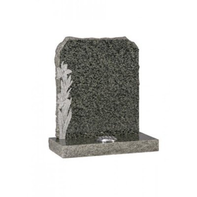 EC68 Green Granite Headstone with rustic edges and hand carved daffodils with natural carved finish.
