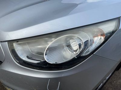 Headlight left HYUNDAI TUCSON II / ix35 I (LM) (2009-2017)