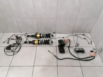 FERRARI 458 F142 FRONT AXLE SUSPENSION LIFT SET 260057 SET OHLINS