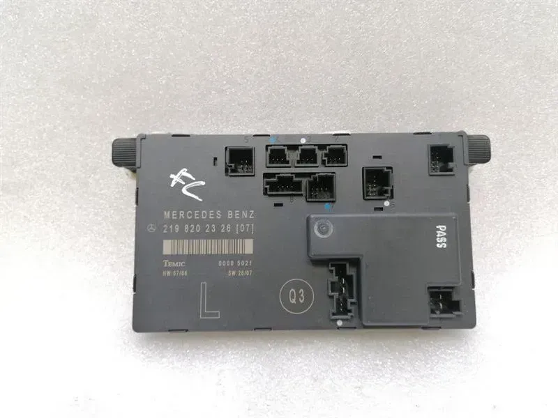Mercedes CLS W219 FLH door module A2198202326 front left door control unit