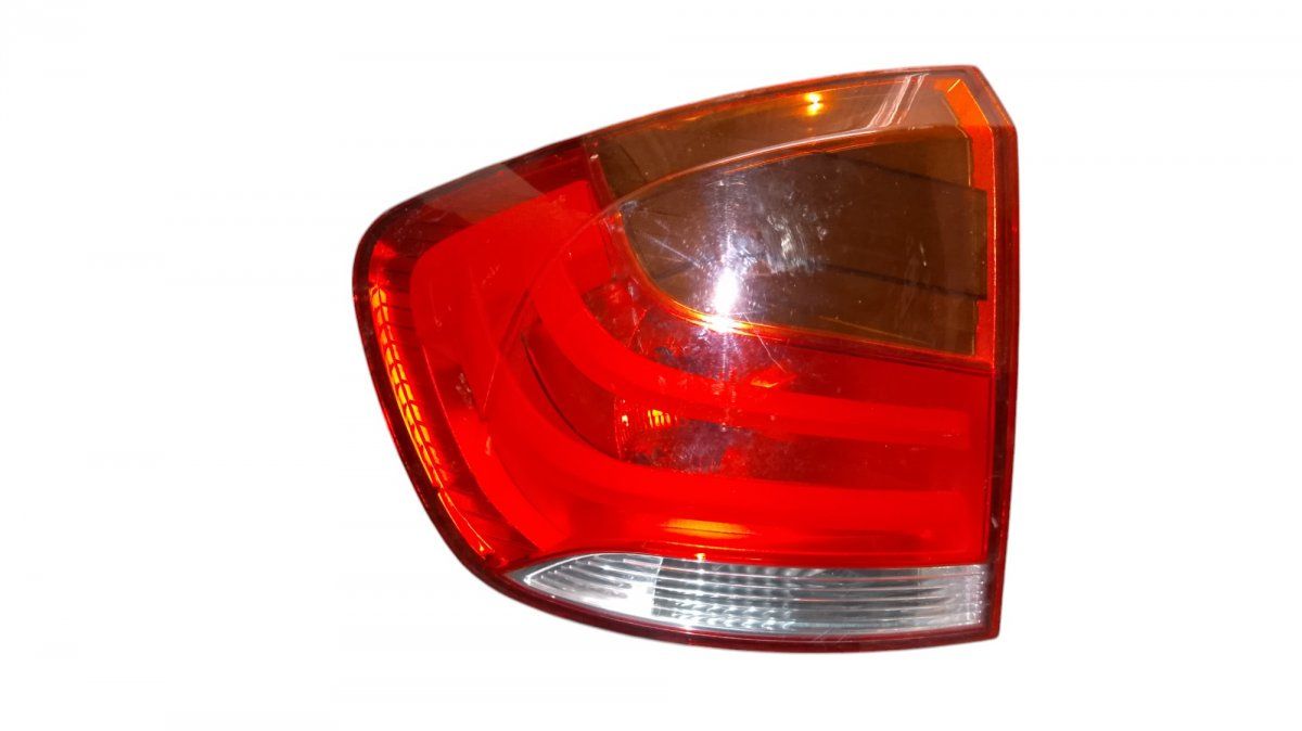 03425600 Tail light left BMW X1 (E84) (2009-2015)