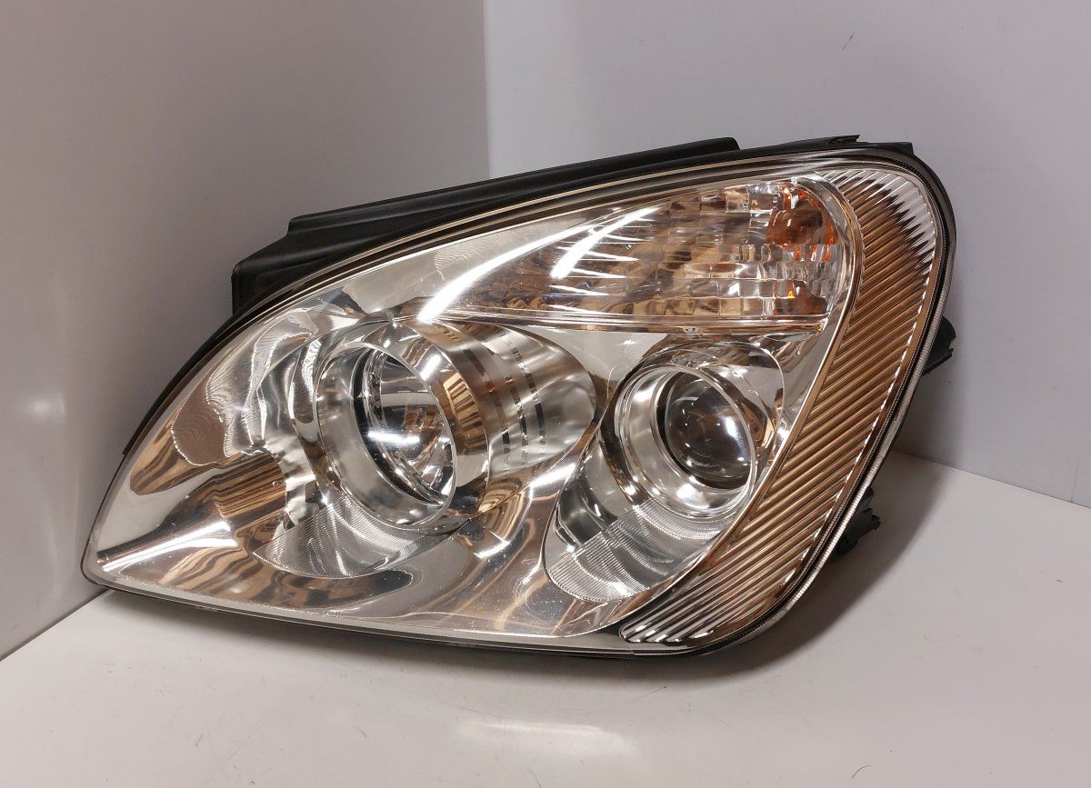921011D020 92101-1D0 921011D0 Headlight left KIA CARENS III (UN) (2006-2013)