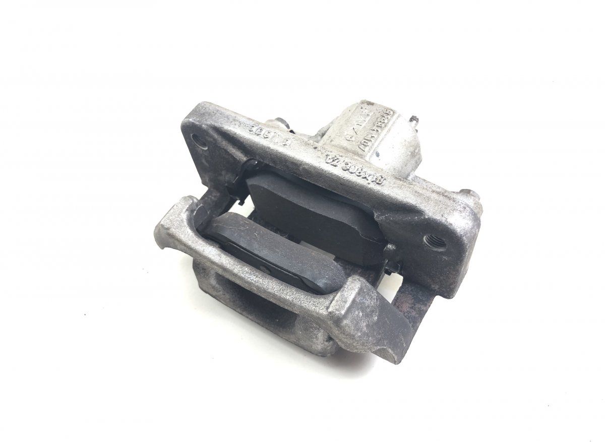 D41125XA0A Brake caliper rear left NISSAN NAVARA III / NP300 (D23) (2014-)