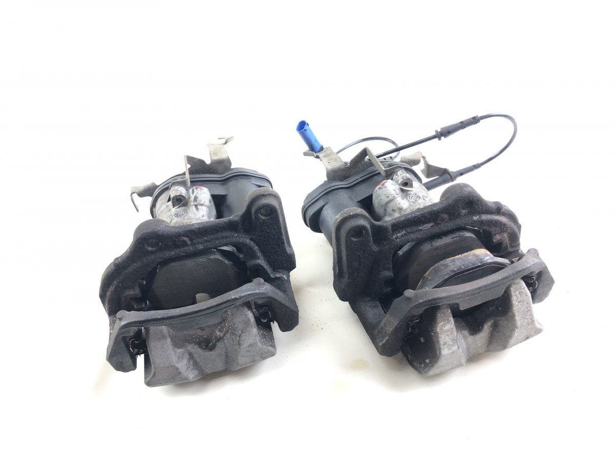 6870575 6870576 Brake caliper rear left BMW 5 (G30, G31) (2016-2024)