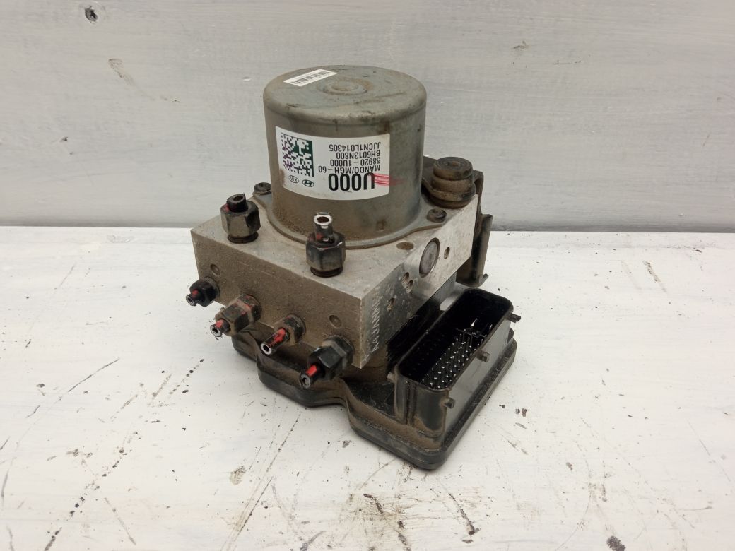 ABS hydraulic unit / pump KIA SORENTO II (XM) (2009-2015)