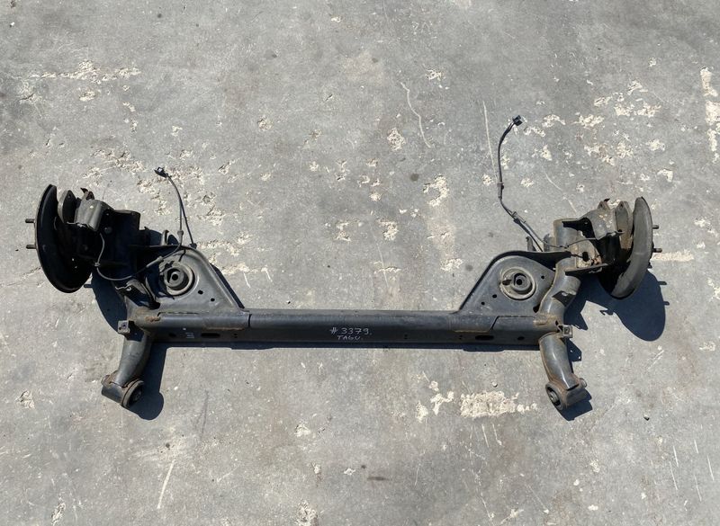 555013NK0A Rear axle Beam NISSAN LEAF I (ZE0) (2010-2017)