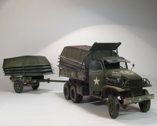 US GMC dump truck, tailer, and boats conv