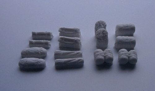 Tent rolls, traps, back packs