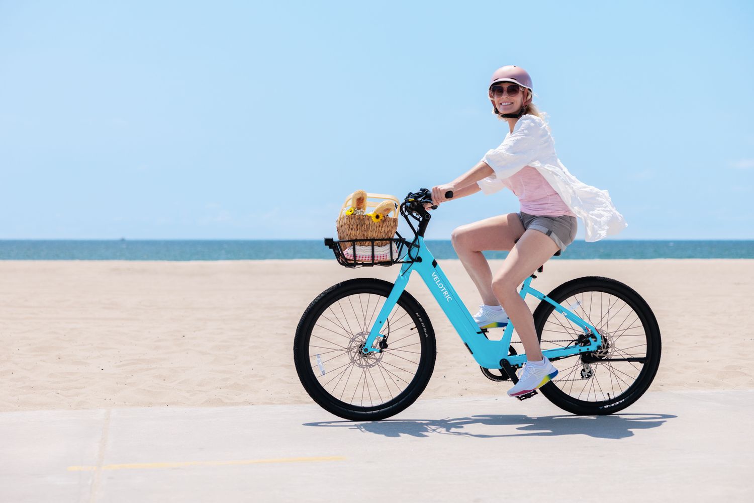 Woman riding her Velotric Breeze 1 Cruiser Ebike