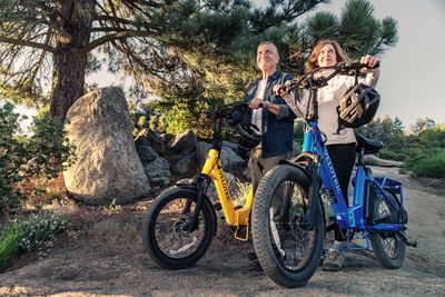 Two people with their Two Velotric Fold 1 Plus Ebikes
