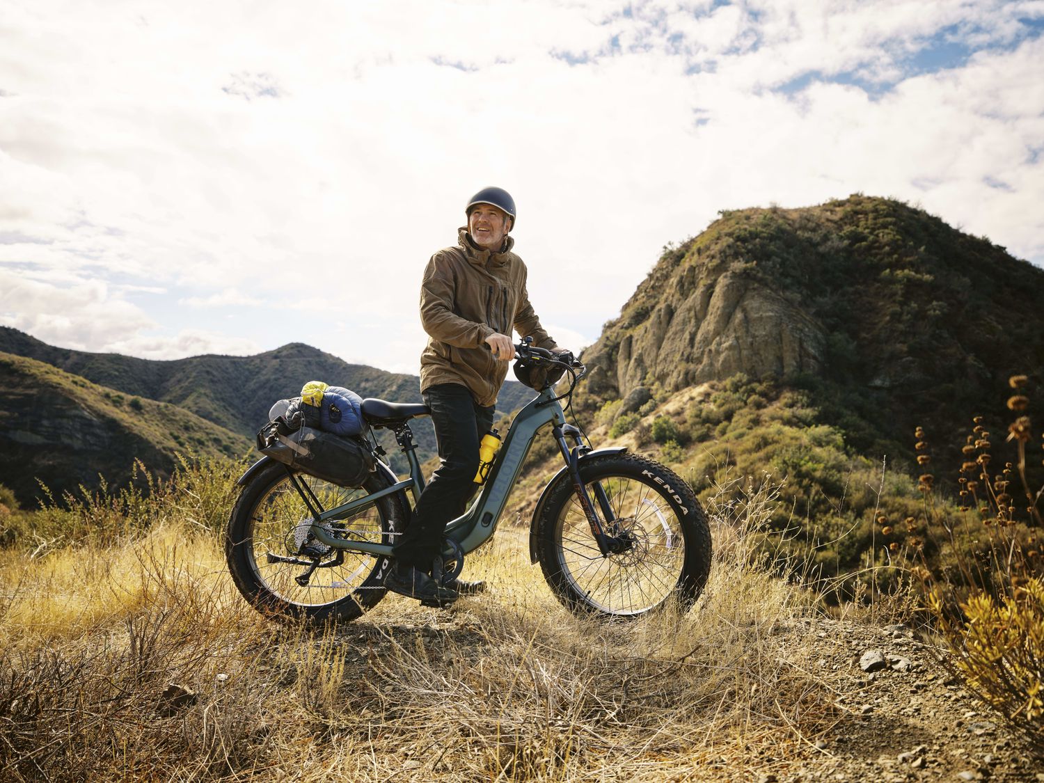 A man riding his Velotric Nomad 2 Step-Thru Ebike