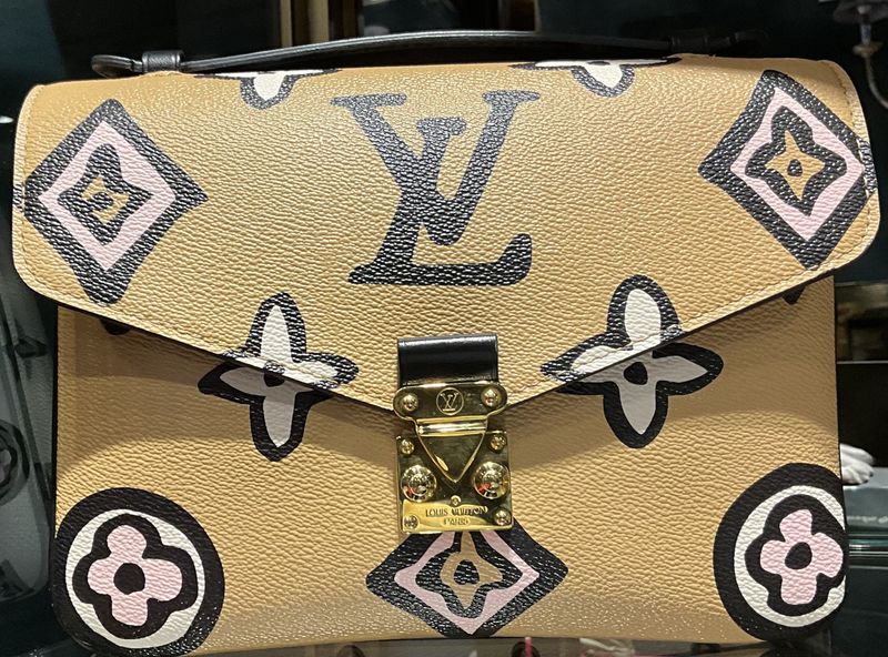 Louis Vuitton Monogram Wild At Heart Pochette Metis