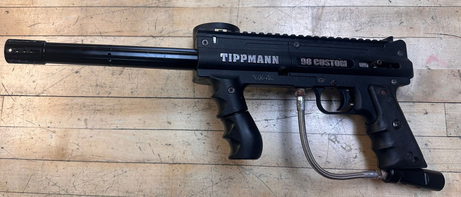 Pre Owned Tippmann 98 Platinum with response trigger and cyclone feed.