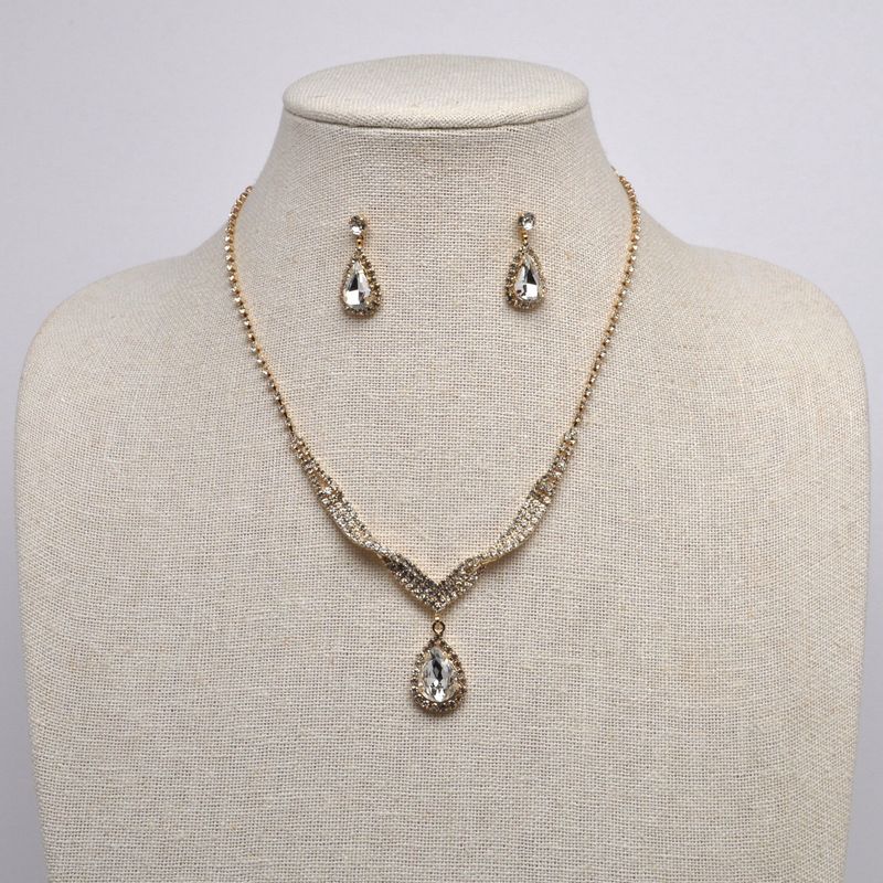 J15494S1G CLR/G TWISTED TRDRP STONE SET