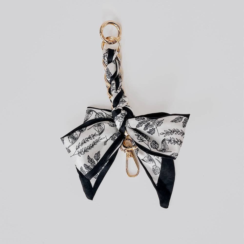 Charmed By Satin Bag Charms Wholesale Charmed By Satin Bag Charms Wholesale, Color: Black Floral