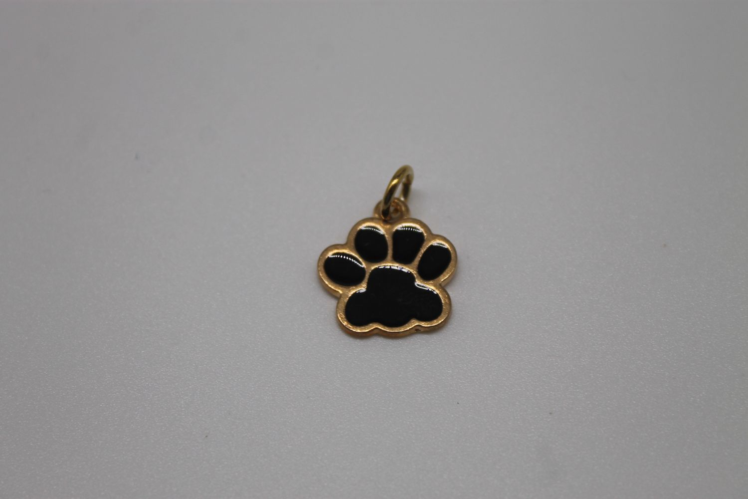 Gold and Black Puppy Paw Print Charm