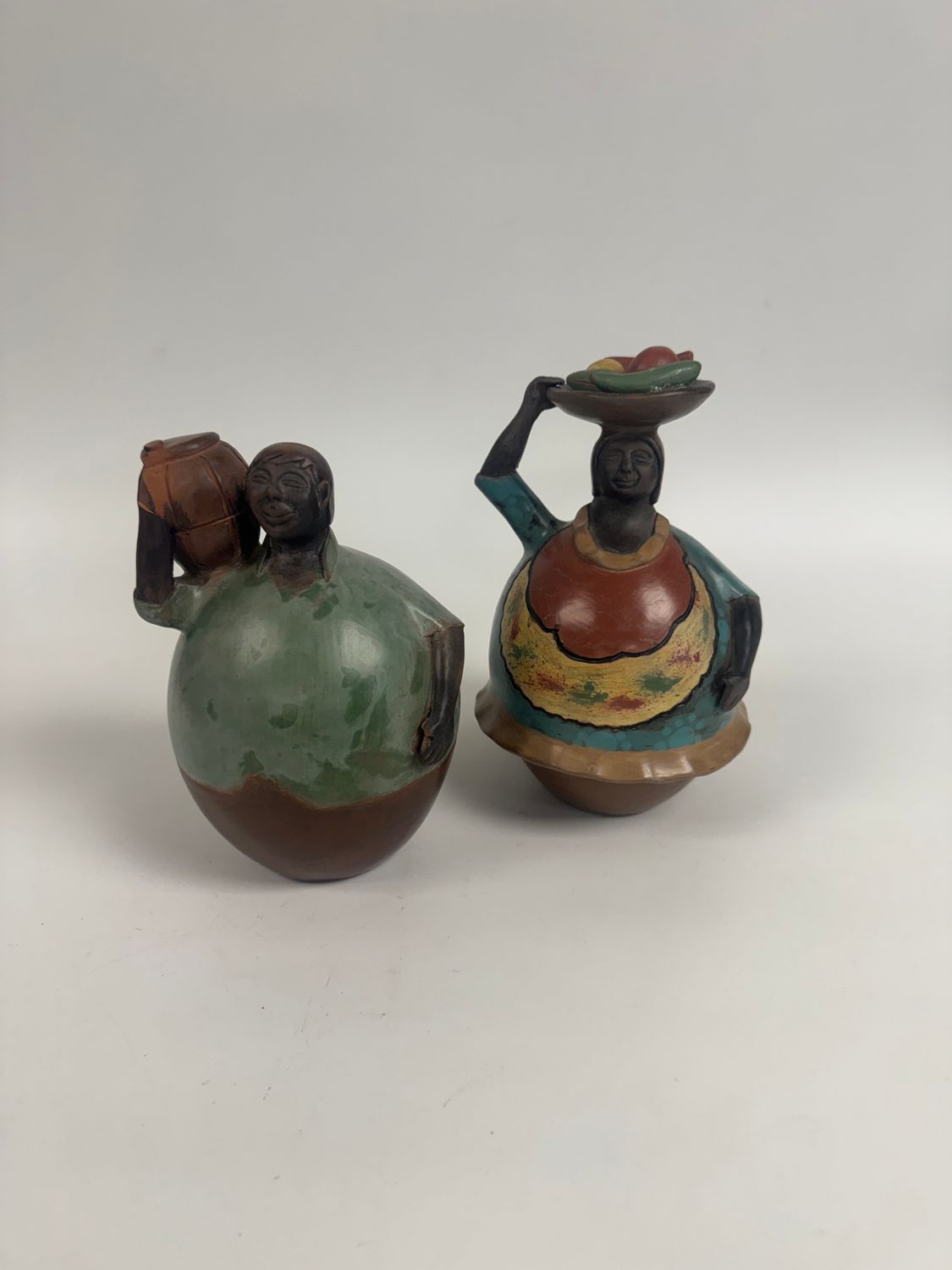 Pair of Peruvian Chulucanas Ceramic Figures