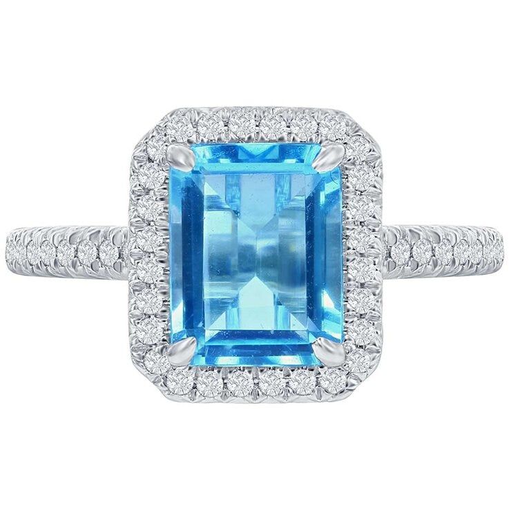 18KT White Gold 0.24ctw Round Diamond Halo Blue Topaz Ring