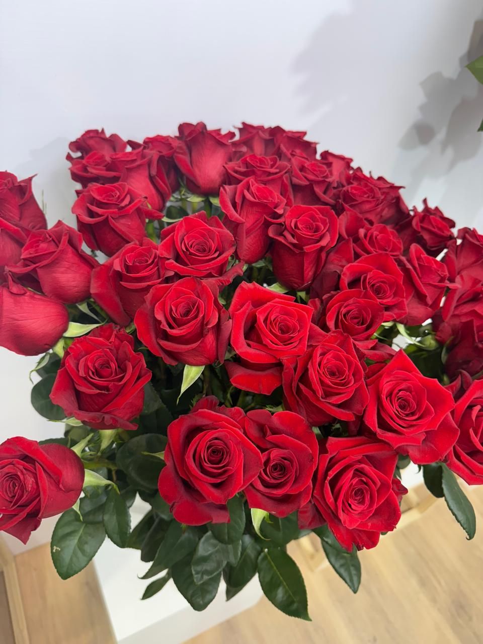 Rosas rojas por docena