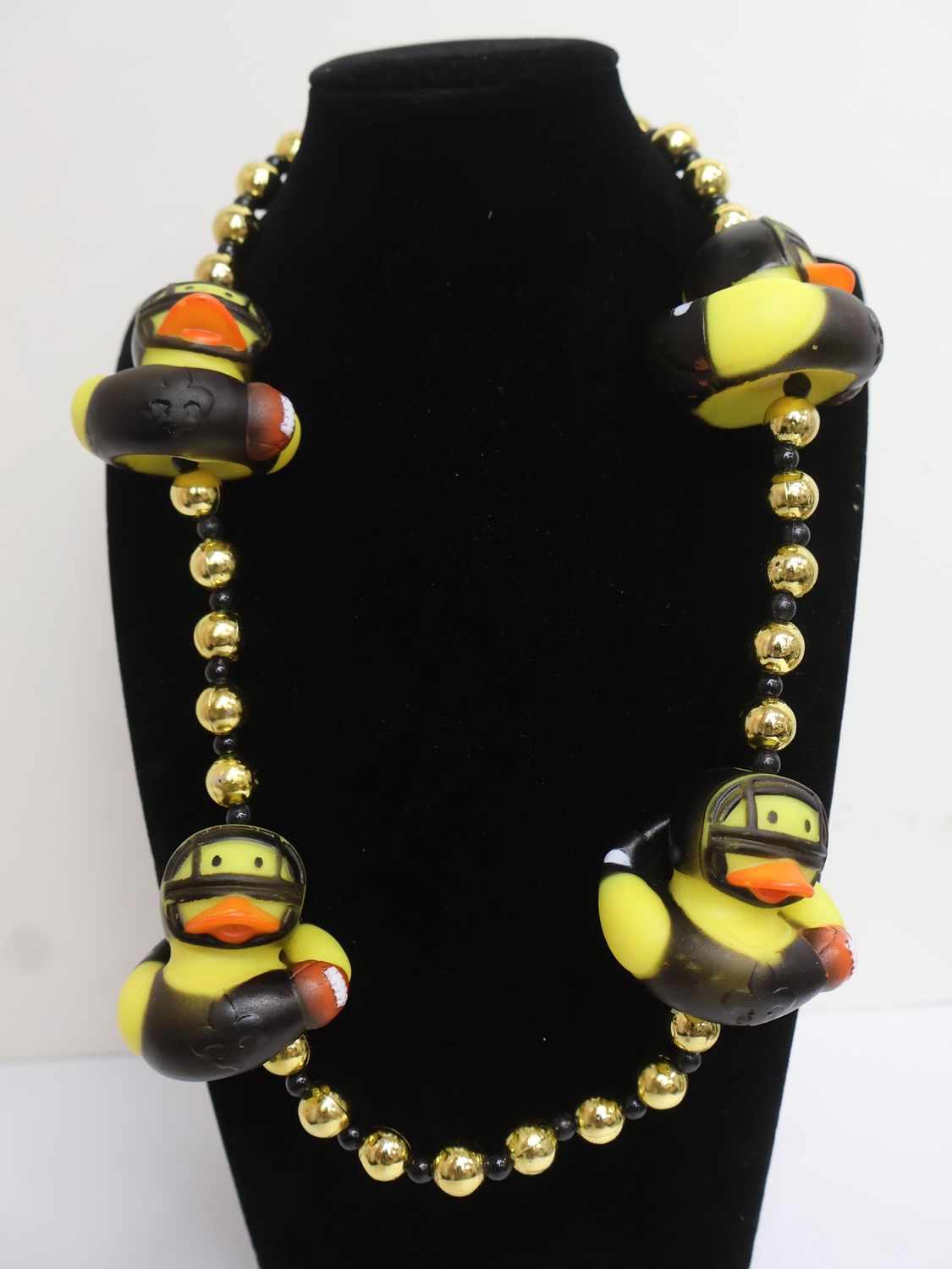42" BLACK/GOLD FOOTBALL DUCK BEAD single