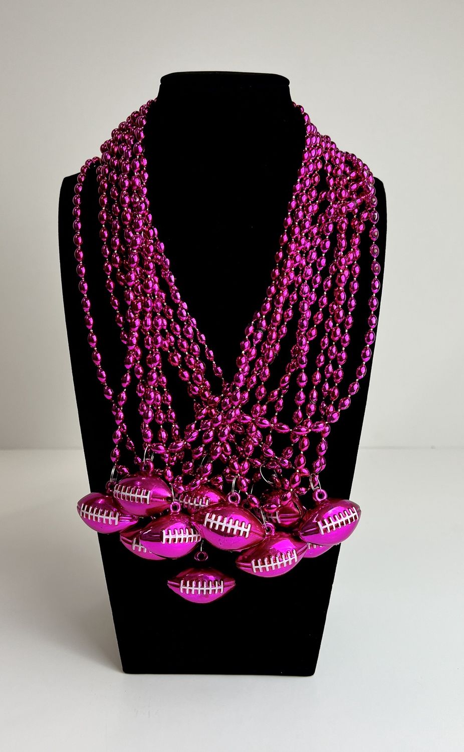 33&quot; 6 x 9mm Oval Pink Bead with Football Pendant (Dozen)