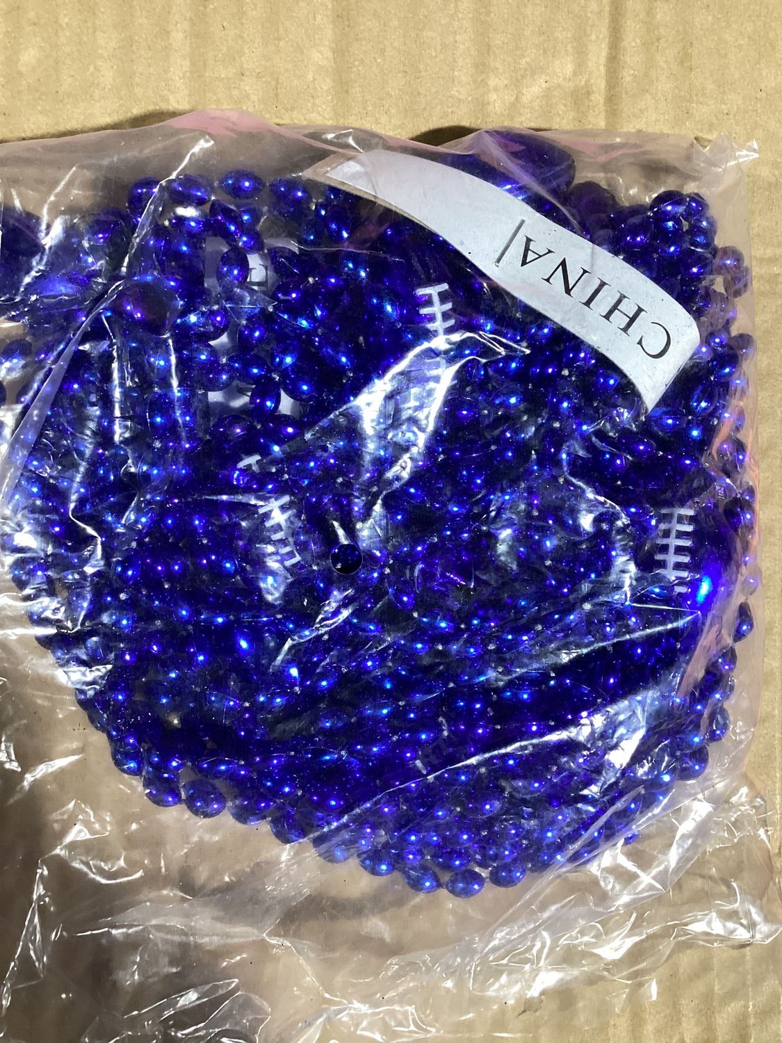 33&quot; 6 x 9mm Oval Royal Blue Bead with Football Pendant (Dozen)