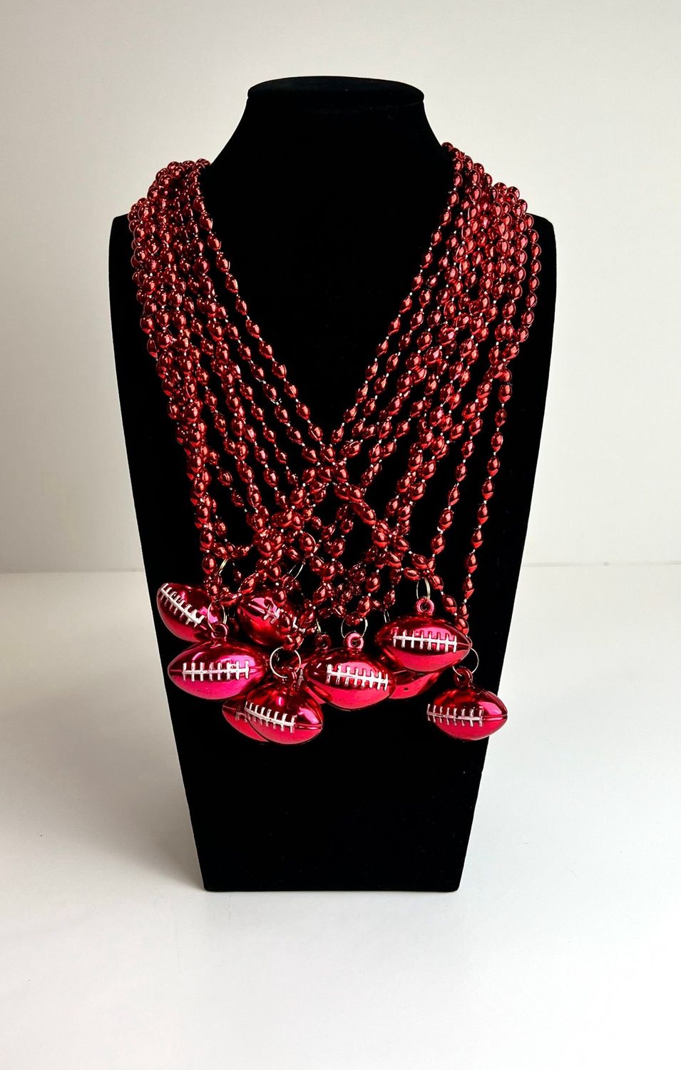 33&quot; 6 x 9mm Oval Red Bead with Football Pendant (Dozen)