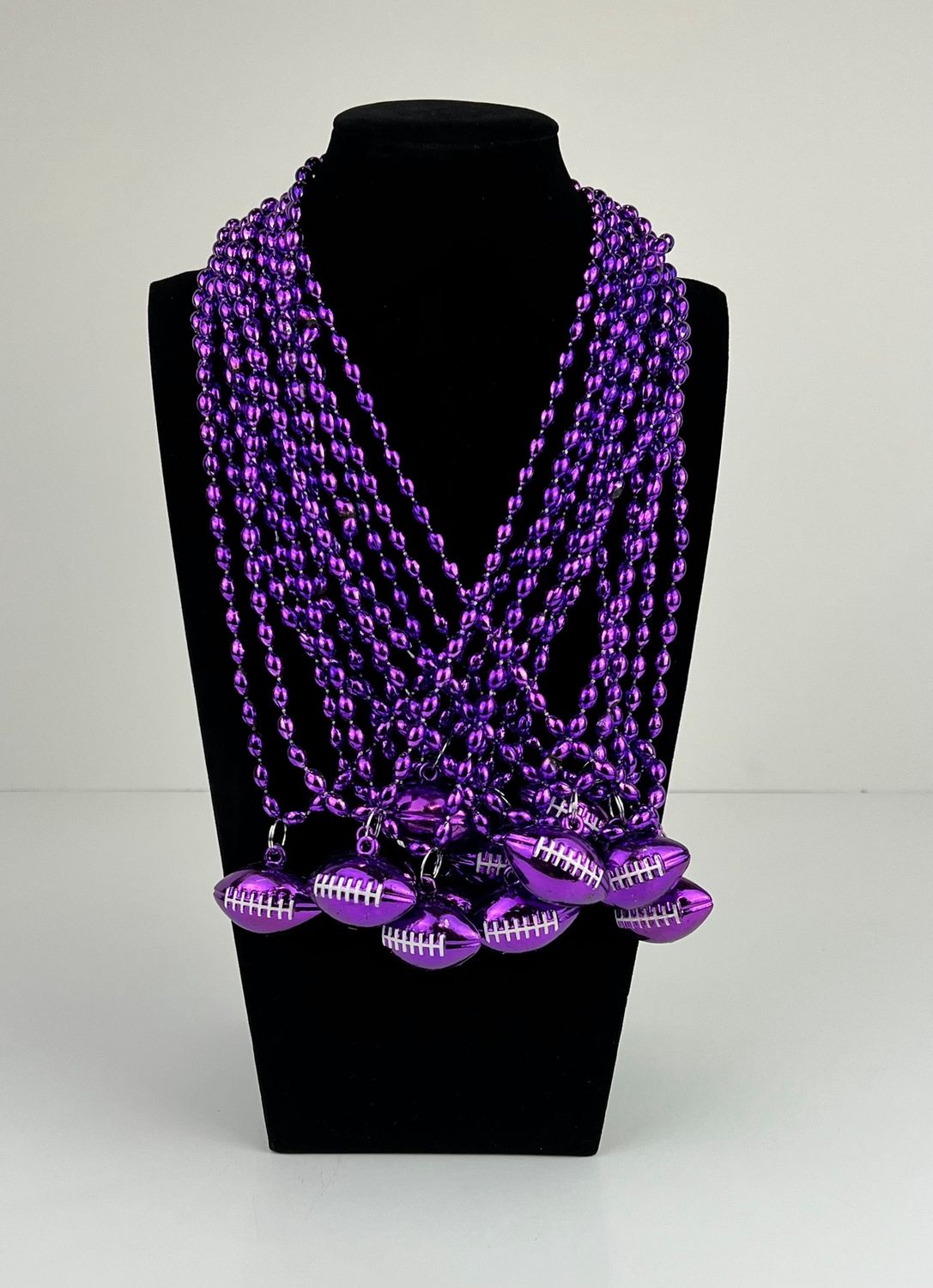 33&quot; 6 x 9mm Oval Purple Bead with Football Pendant (Dozen)