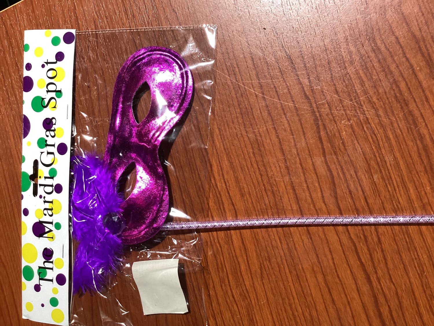 Metallic Purple Mask with Purple Feathers on Side with Purple Handle