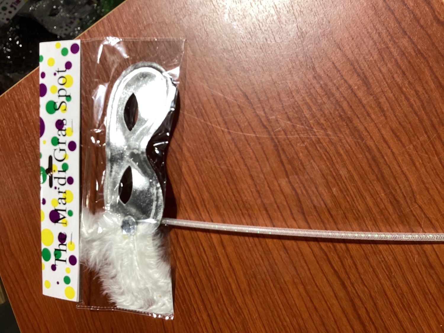 Metallic Silver Mask with White Feathers on Side with Silver Handle