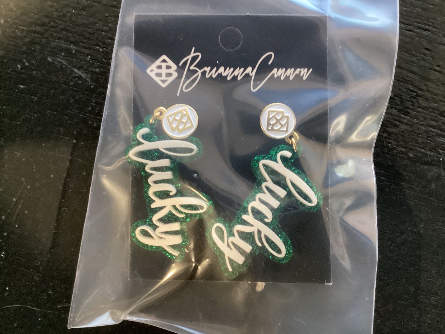 St Patrick's Day 2022 - Dark Green Glitter Lucky Earrings with White BC Logo Top