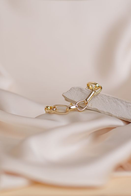 bransoletka LUMI pozłacana 18 karatowym złotem duże owalne ogniwa łączone małymi krągłymi, gładka błyszcząca basic FRIGG jwl