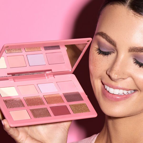 Merle Norman Starry Rosé Shadow Palette slightly opened to show various eye shadow colors included.