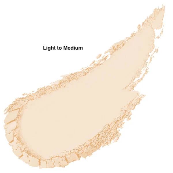 Merle Norman Soft-Focus Finishing Powder in Light to Medium Shade, slightyl opened tro show color and makeup brush. 