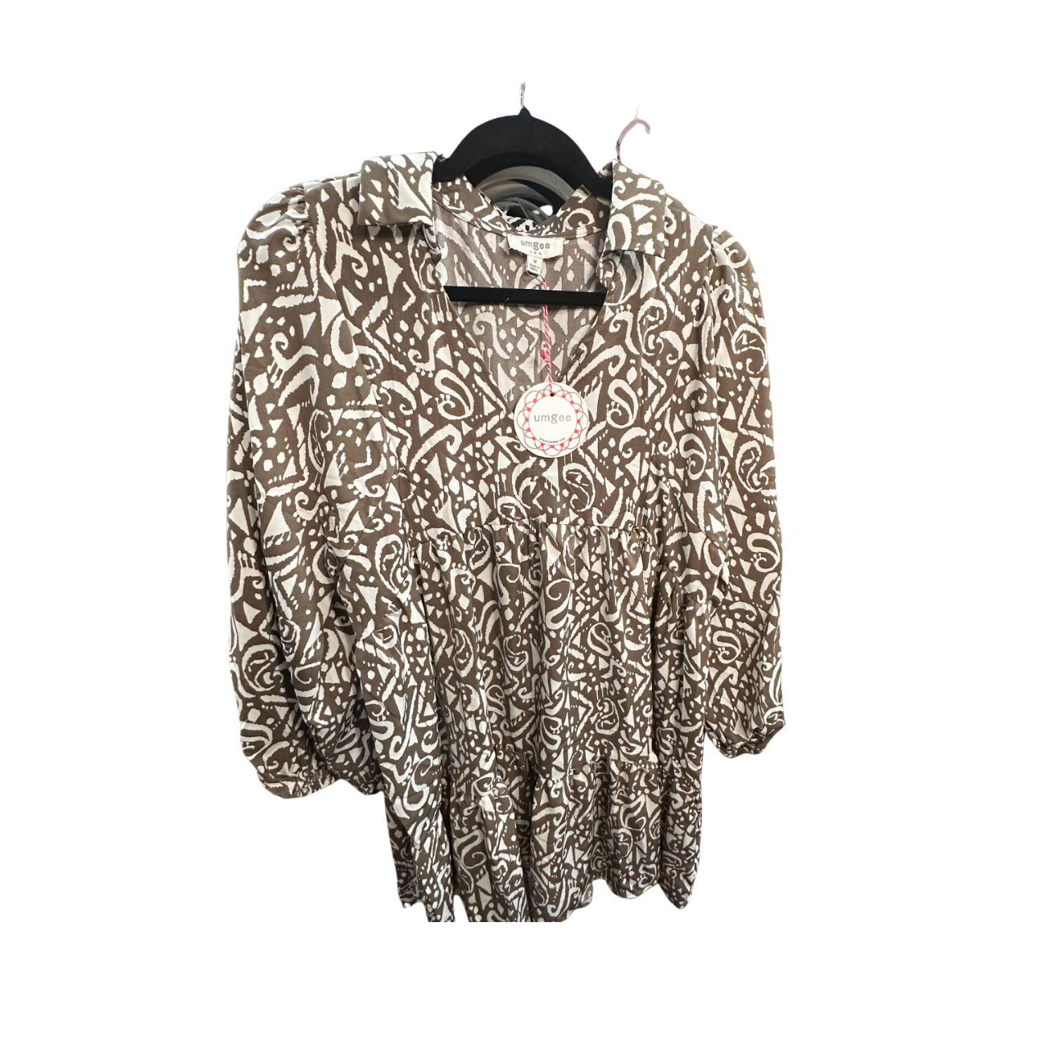 UMGEE Castell Ladies Flowy Top over a white background showing its unique color and fabric design. 