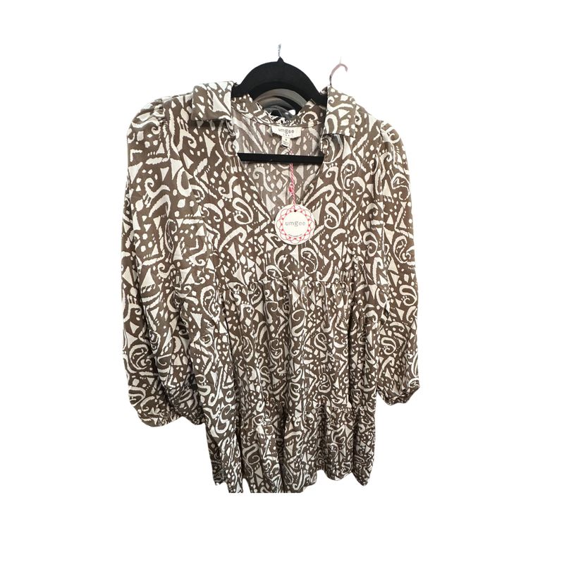 UMGEE Castell Ladies Flowy Top over a white background showing its unique color and fabric design. 