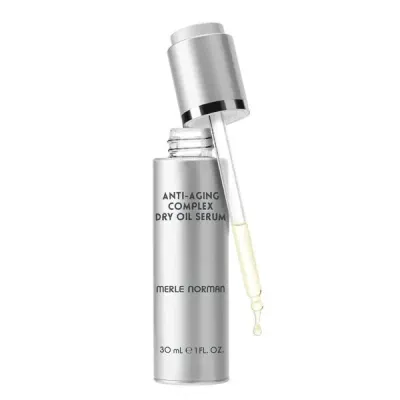 Merle Norman Anti-Aging Complex Dry Oil Serum on a white background.