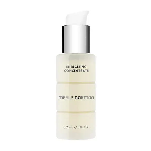 Merle Norman Energizing Concentrate bottle sitting on a white background.